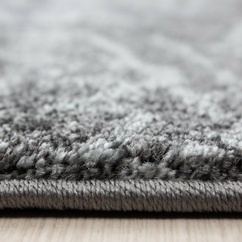Short pile carpet design contour cut checkered gray black mottled