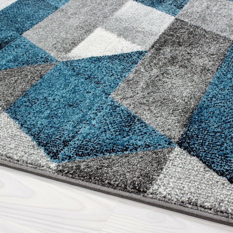 Tapis de salon à poils ras design motif triangle turquoise gris chiné