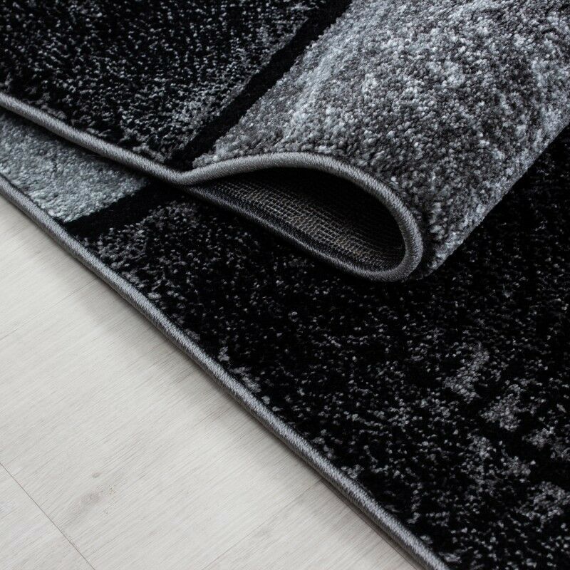 Short pile carpet design contour cut checkered gray black mottled