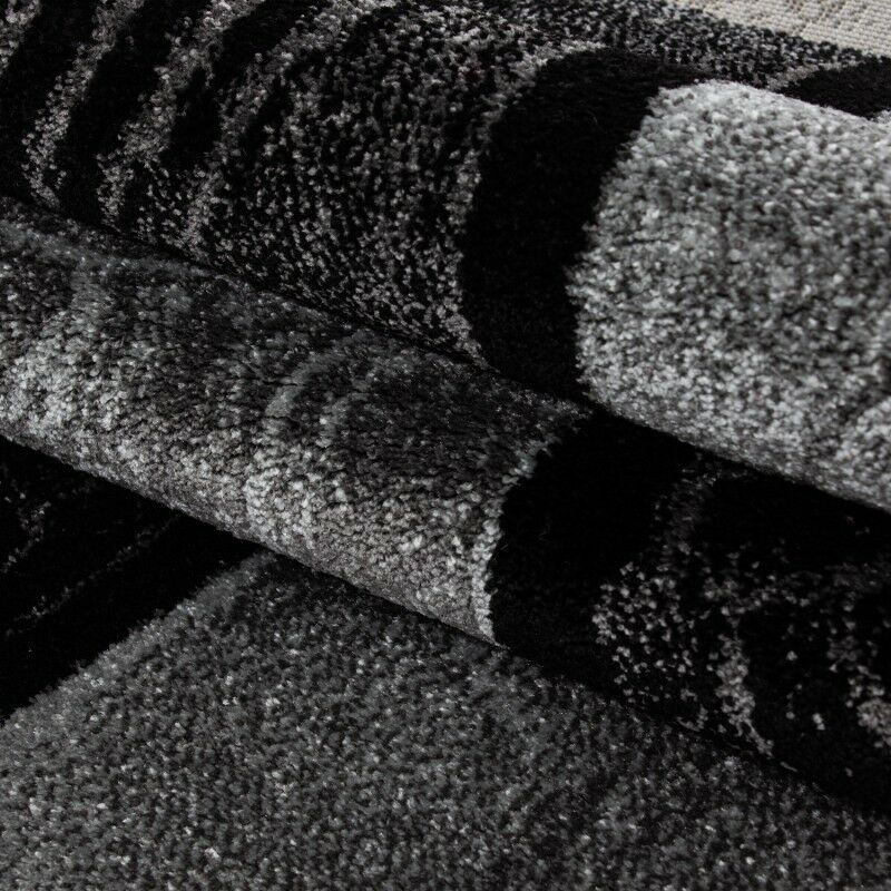 Short pile carpet design contour cut checkered gray black mottled