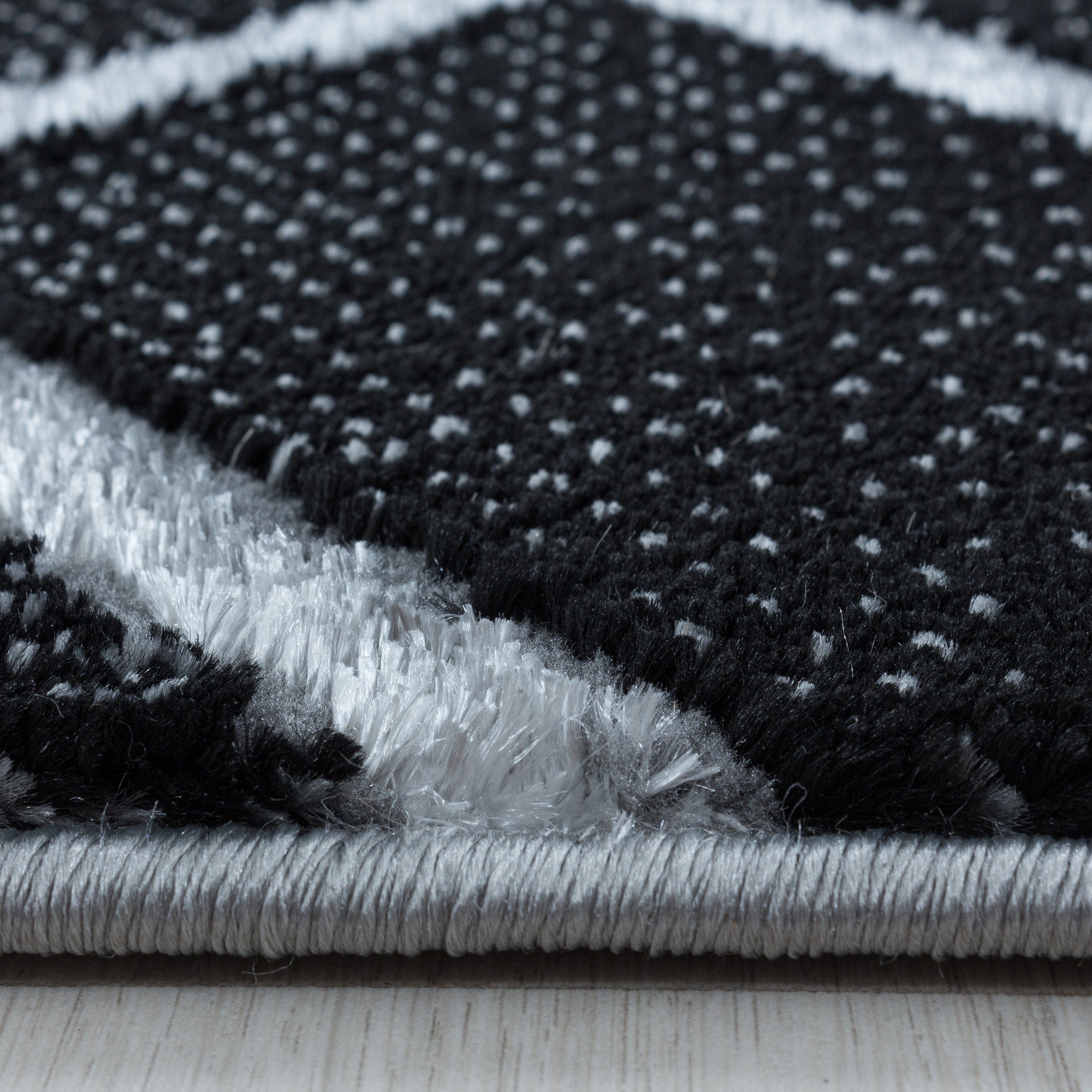 Tapis salon tapis design scandinave aspect marbre avec fibres brillantes