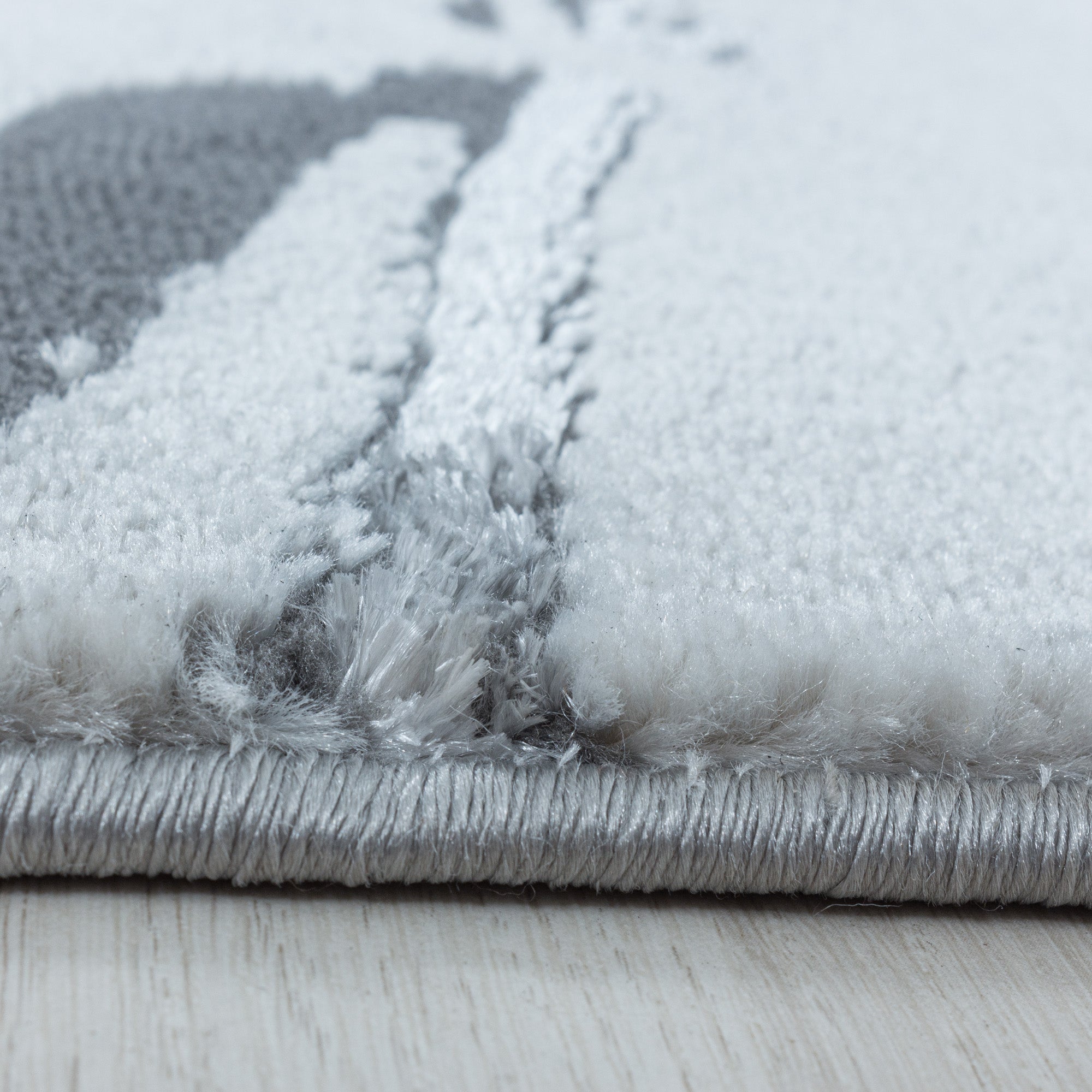 Tapis salon tapis design scandinave aspect marbre avec fibres brillantes