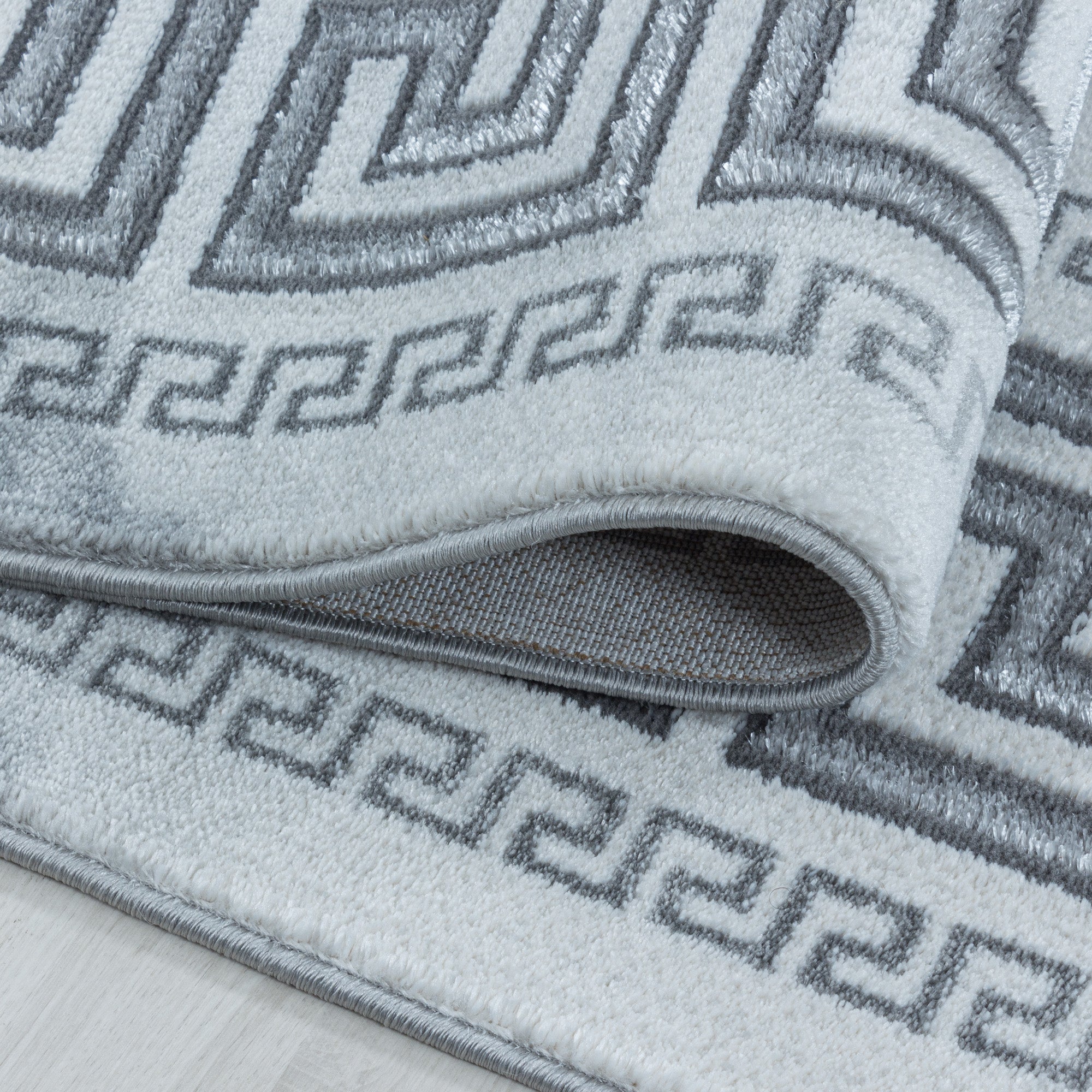 Tapis salon tapis design scandinave aspect marbre avec fibres brillantes