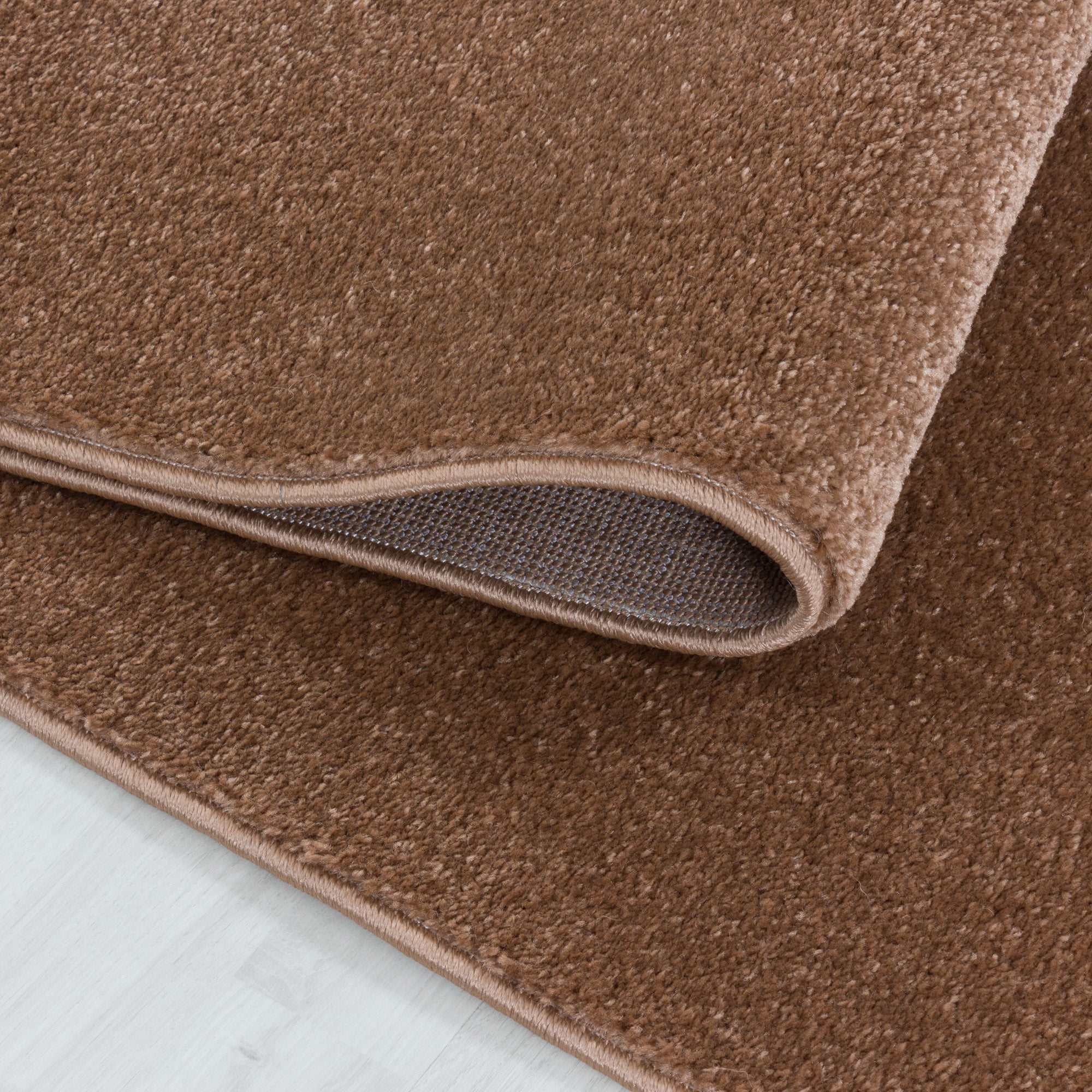 Modern designer short pile rug for living room, plain, robust, easy to care for