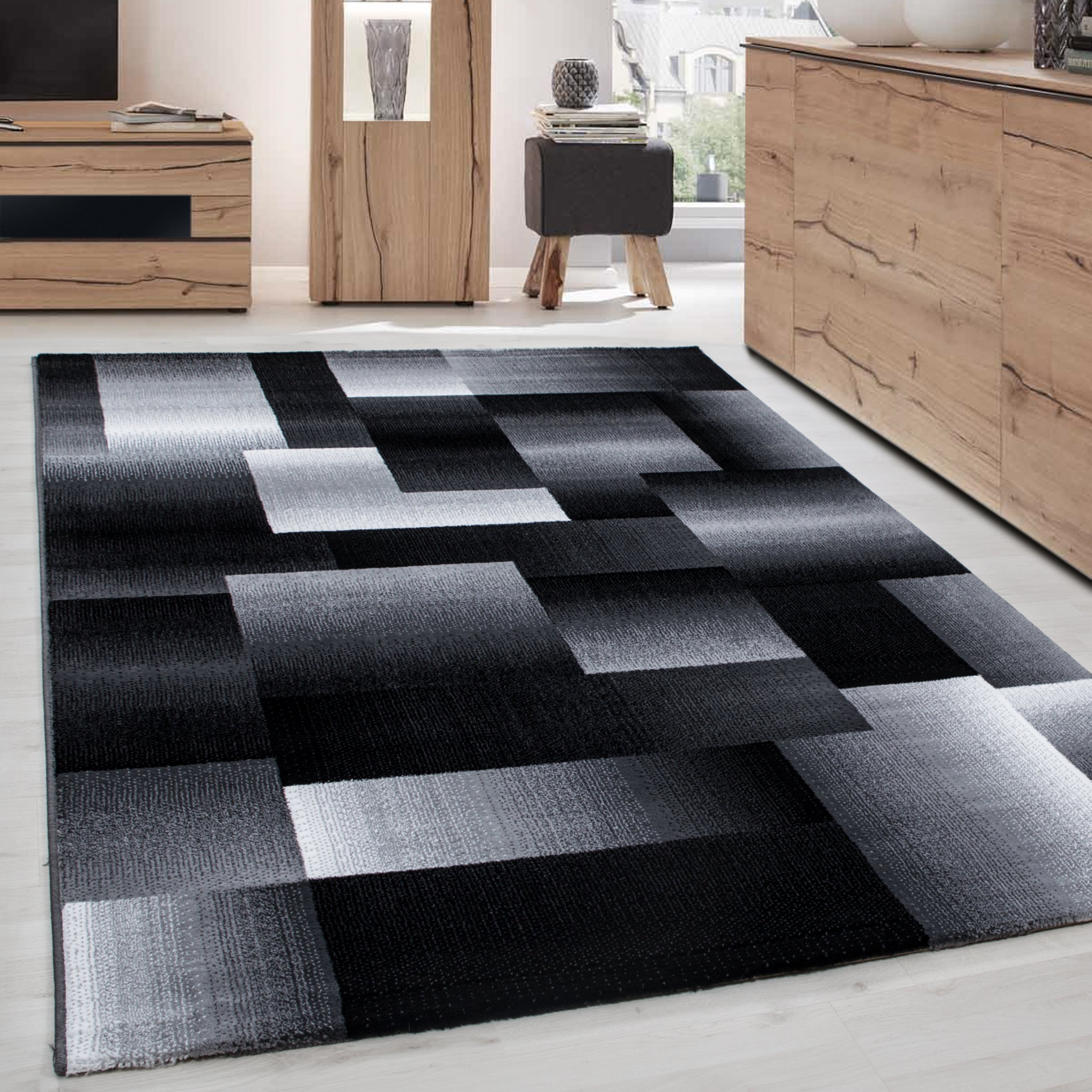 Modern short pile carpet for living room, abstract checkered design, black, easy to care for