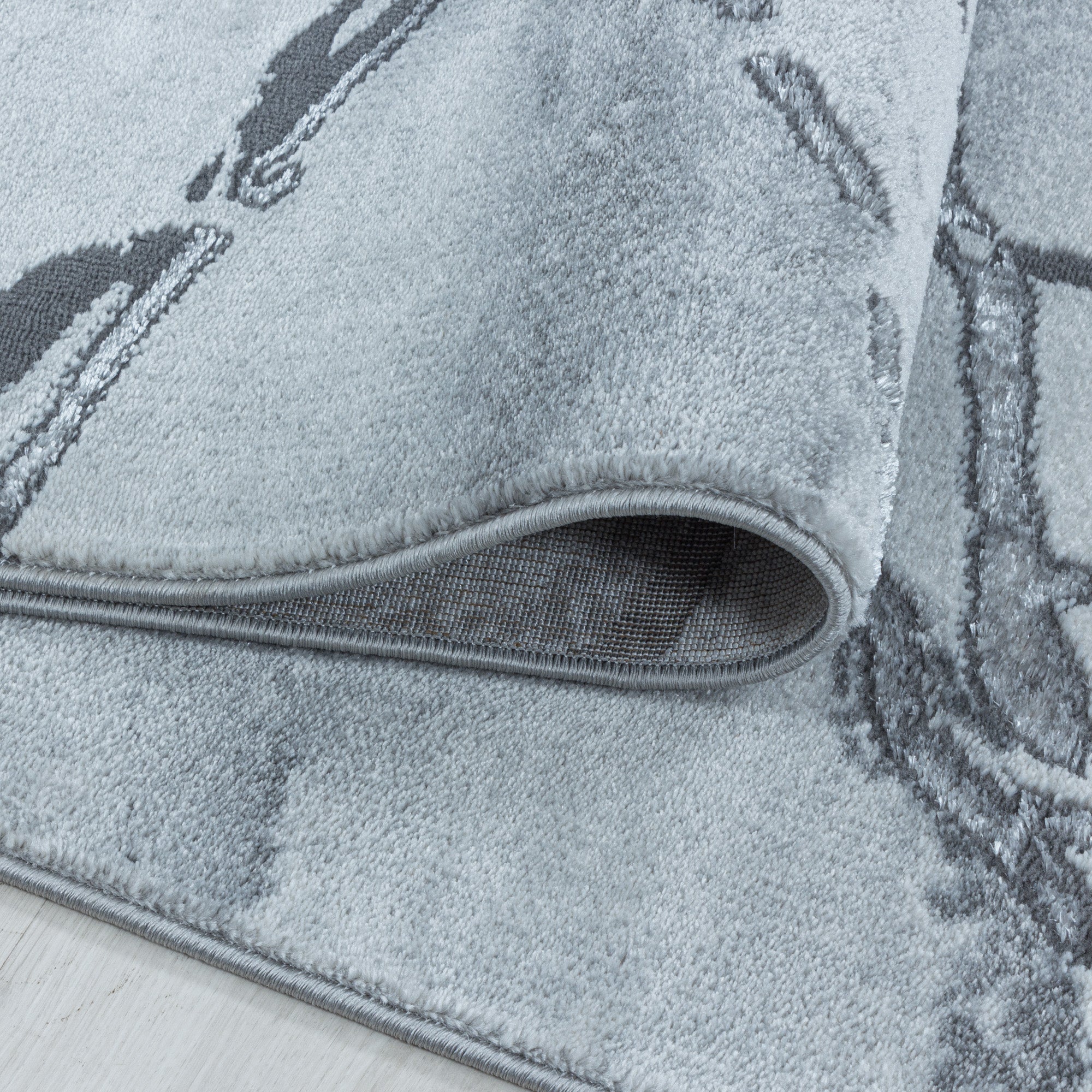 Tapis salon tapis design scandinave aspect marbre avec fibres brillantes