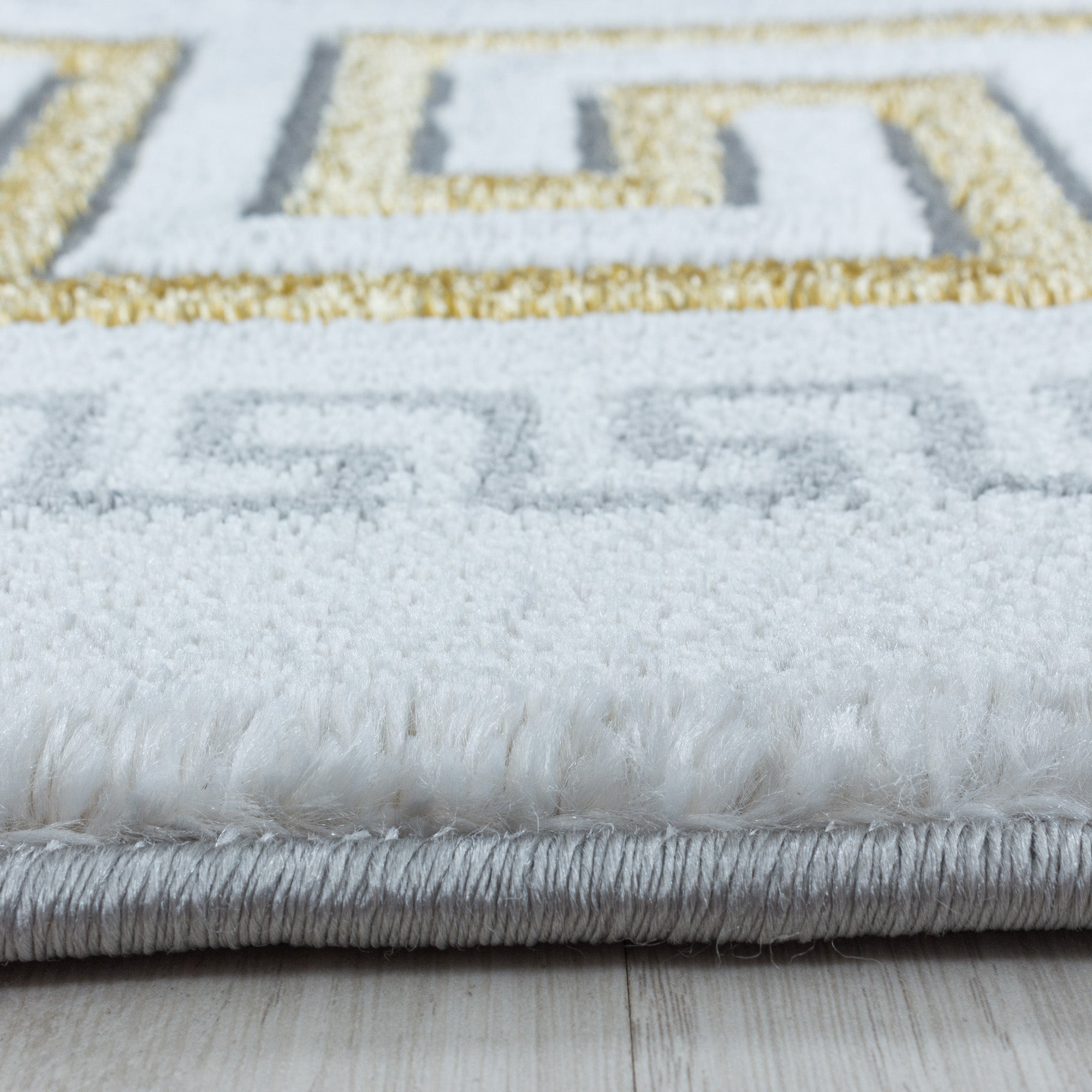 Tapis salon tapis design scandinave aspect marbre avec fibres brillantes