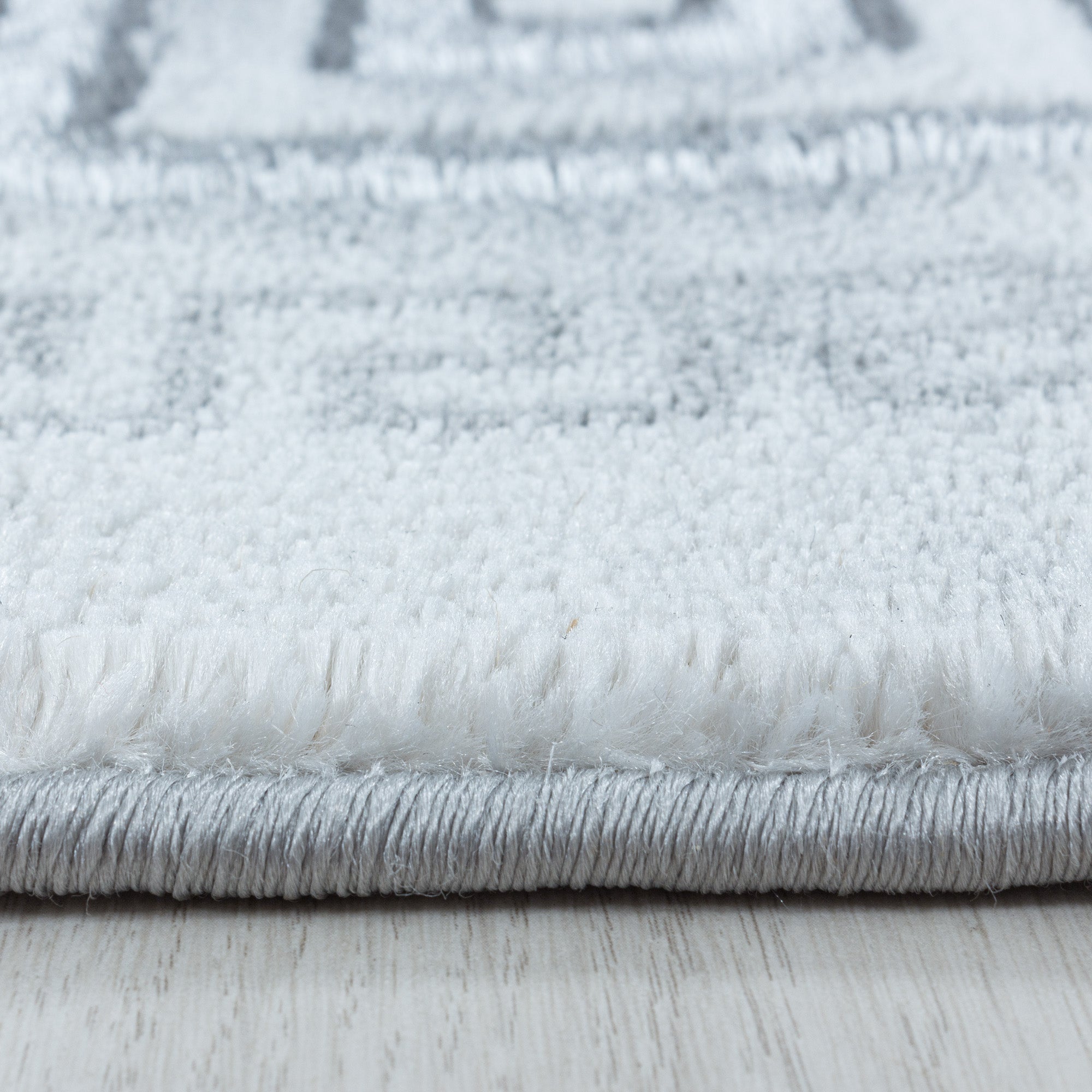 Tapis salon tapis design scandinave aspect marbre avec fibres brillantes